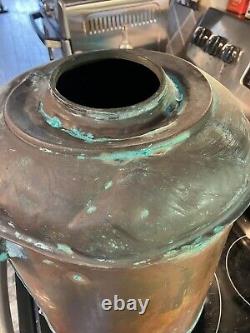 Antique copper moonshine still